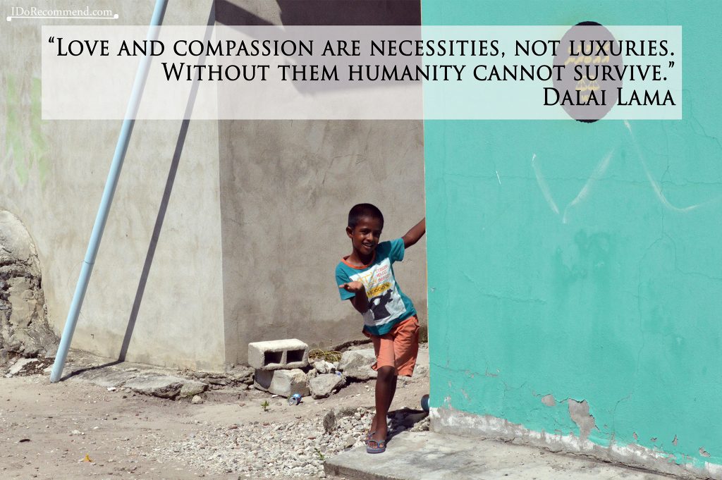 Quote "Love and compassion are necessities, not luxuries; without them humanity cannot survive" (photo from Maldives, Dharavandhoo island)